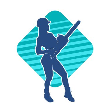 Elektrikli testereli seksi bir kadın işçinin silüeti. Elinde testere tutan bir oduncu gibi giyinmiş seksi kadın duruşu silueti..