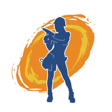 Makineli elektrikli matkap taşıyan kadın bir inşaat işçisinin silueti. Elektrikli matkap tutan bir kadın inşaatçının silueti..