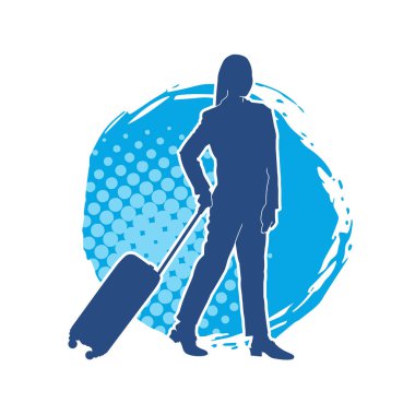 İnce moda bir kadın yolcunun silueti seyahat valizi taşıyor.