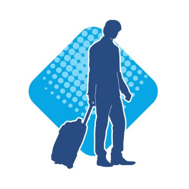 Seyahat valizi taşıyan bir erkek yolcunun silueti.