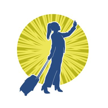 İnce moda bir kadın yolcunun silueti seyahat valizi taşıyor.