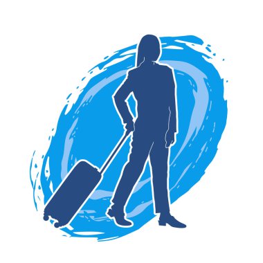 İnce moda bir kadın yolcunun silueti seyahat valizi taşıyor.