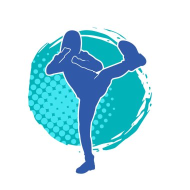Dövüş sanatları tekmesi atan bir kadının silueti. Sportif bir kadının silueti tekme hareketi yapıyor..