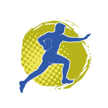 Rugby sporcusunun silueti iş başında. Rugby oynayan sporcu bir adamın silueti..