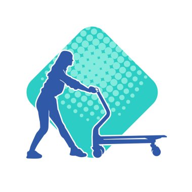 Tramvay tekerleği ya da el arabası kullanan bir kadın silueti. Bir kadının silueti. İten bir lori çarkının..