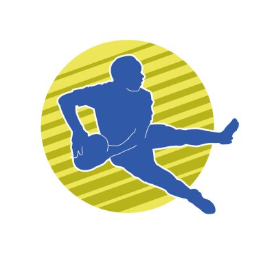 Rugby sporcusunun silueti iş başında. Rugby oynayan sporcu bir adamın silueti..