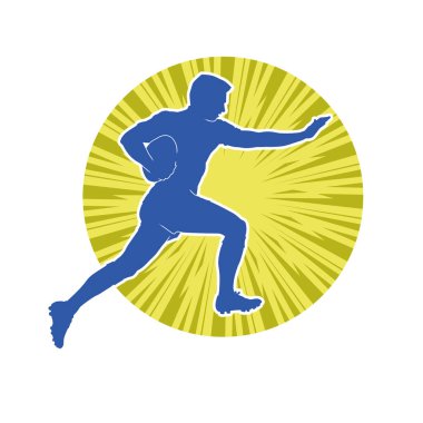 Rugby sporcusunun silueti iş başında. Rugby oynayan sporcu bir adamın silueti..