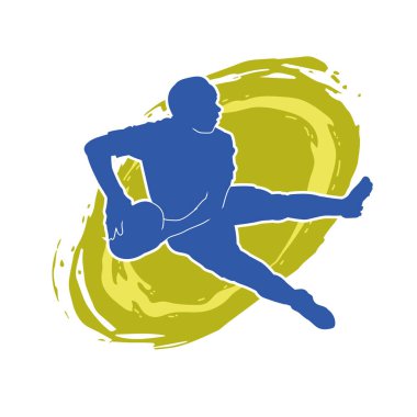 Rugby sporcusunun silueti iş başında. Rugby oynayan sporcu bir adamın silueti..