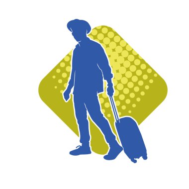 Seyahat valizi taşıyan bir erkek yolcunun silueti.