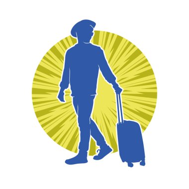 Seyahat valizi taşıyan bir erkek yolcunun silueti.