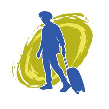 Seyahat valizi taşıyan bir erkek yolcunun silueti.