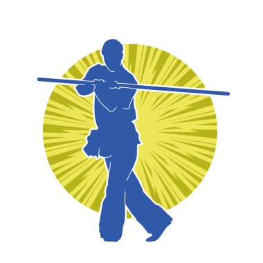 Dövüş sanatlarında dövüşen bir erkeğin silüeti, tahta sopayı silah olarak kullanıyor. Tahta sırıkla dövüş sanatları yapan bir adamın silueti..