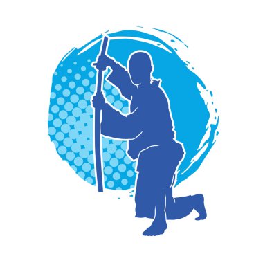 Harekete geçmiş bir kılıç savaşçısı silueti. Kılıç taşıyan bir dövüş sanatçısı silueti. Kendo dövüş sanatının silueti..