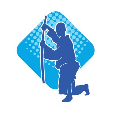 Harekete geçmiş bir kılıç savaşçısı silueti. Kılıç taşıyan bir dövüş sanatçısı silueti. Kendo dövüş sanatının silueti..
