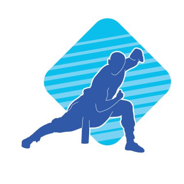 Doğu dövüş sanatı pozu veren bir adamın silueti. Dövüş sanatlarında bir erkeğin silueti..