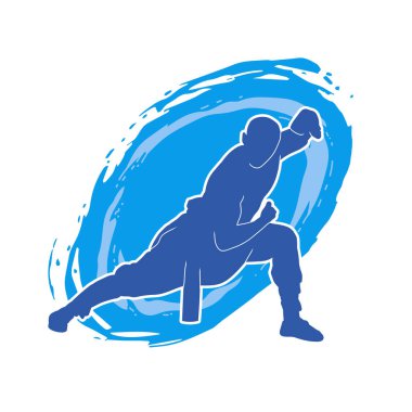 Doğu dövüş sanatı pozu veren bir adamın silueti. Dövüş sanatlarında bir erkeğin silueti..