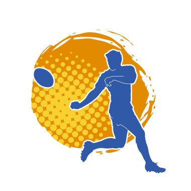 Rugby sporcusunun silueti iş başında. Rugby oynayan sporcu bir adamın silueti..