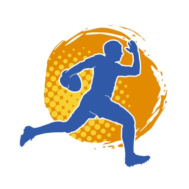 Rugby sporcusunun silueti iş başında. Rugby oynayan sporcu bir adamın silueti..