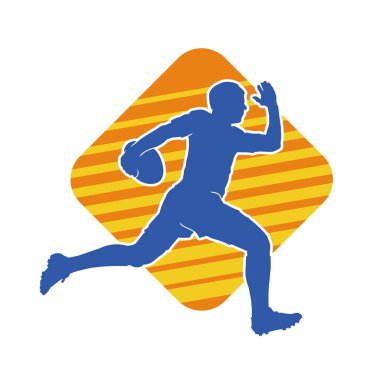 Rugby sporcusunun silueti iş başında. Rugby oynayan sporcu bir adamın silueti..