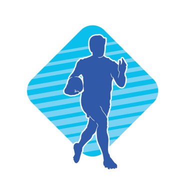 Rugby sporcusunun silueti iş başında. Rugby oynayan sporcu bir adamın silueti..