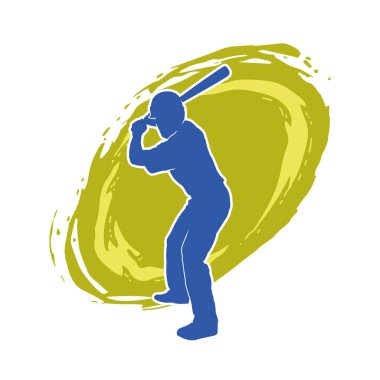 Hareketli bir erkek beyzbol oyuncusunun silueti. Vurucu olarak beyzbol oynayan bir adamın silueti..