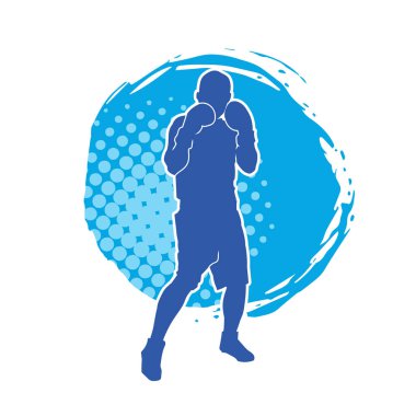 Erkek boks atletinin silueti iş başında. Boks sporu için eldiven giyen kaslı bir adamın silueti..