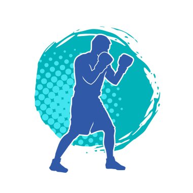 Erkek boks atletinin silueti iş başında. Boks sporu için eldiven giyen kaslı bir adamın silueti..
