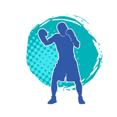 Erkek boks atletinin silueti iş başında. Boks sporu için eldiven giyen kaslı bir adamın silueti..