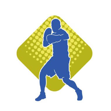 Erkek boks atletinin silueti iş başında. Boks sporu için eldiven giyen kaslı bir adamın silueti..