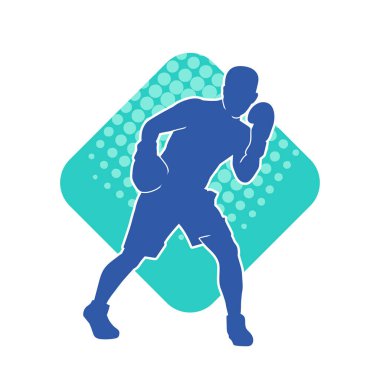 Erkek boks atletinin silueti iş başında. Boks sporu için eldiven giyen kaslı bir adamın silueti..