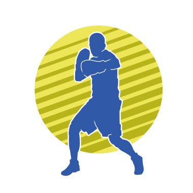 Erkek boks atletinin silueti iş başında. Boks sporu için eldiven giyen kaslı bir adamın silueti..