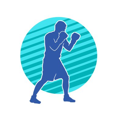 Erkek boks atletinin silueti iş başında. Boks sporu için eldiven giyen kaslı bir adamın silueti..