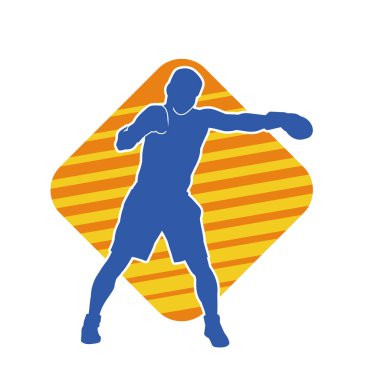 Erkek boks atletinin silueti iş başında. Boks sporu için eldiven giyen kaslı bir adamın silueti..
