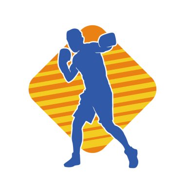 Erkek boks atletinin silueti iş başında. Boks sporu için eldiven giyen kaslı bir adamın silueti..