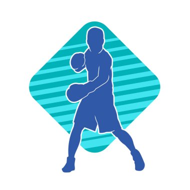 Erkek boks atletinin silueti iş başında. Boks sporu için eldiven giyen kaslı bir adamın silueti..