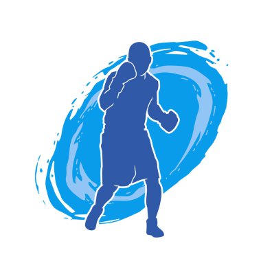 Erkek boks atletinin silueti iş başında. Boks sporu için eldiven giyen kaslı bir adamın silueti..