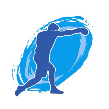 Erkek boks atletinin silueti iş başında. Boks sporu için eldiven giyen kaslı bir adamın silueti..
