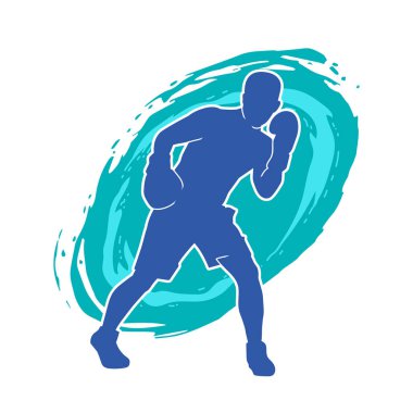 Erkek boks atletinin silueti iş başında. Boks sporu için eldiven giyen kaslı bir adamın silueti..