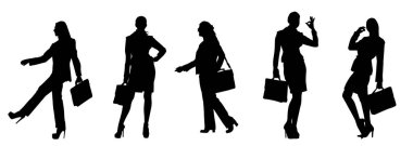 Silüet bir grup iş kadını, evrak çantası taşıyorlar.