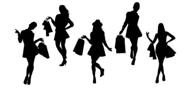 Genç bayanlardan oluşan siluet bir grup, alışveriş torbaları taşıyorlar.