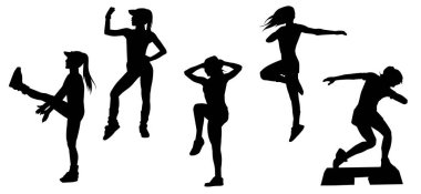 Siluet grubu spor yapan bir grup kadın aerobik egzersizler yapıyor.