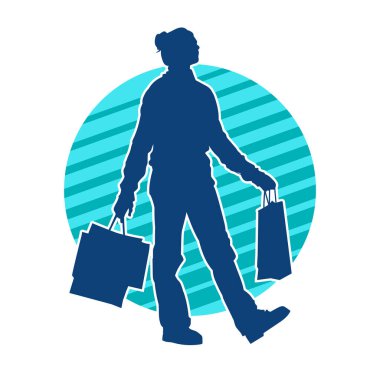 Sıska genç bir kadının silüeti alışveriş torbaları taşıyor..