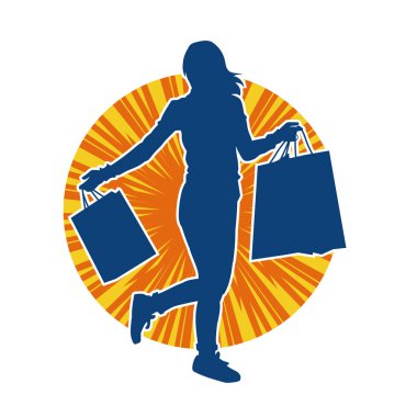 Sıska genç bir kadının silüeti alışveriş torbaları taşıyor..