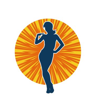 Dişi poziyonunda zayıf bir kadın modelinin silüeti. Çekici duruşu olan genç bir kadının silueti..