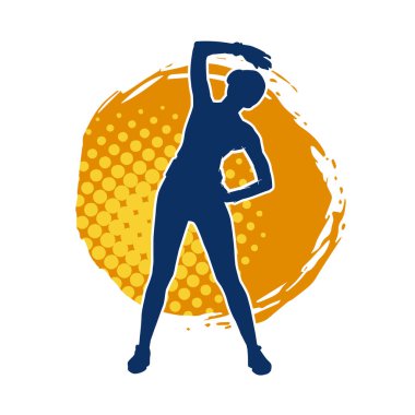 Zayıf kadın silueti pilates yapıyor ya da fiziksel egzersiz yapıyor.