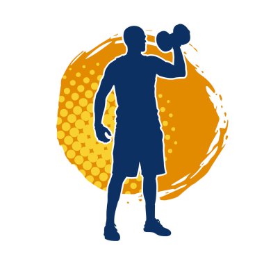 Dambıl kullanarak egzersiz yapan kaslı bir adamın silüeti.