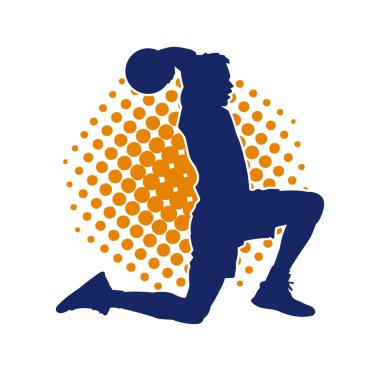 Diz çökerken top atan bir erkek futbolcunun silueti.