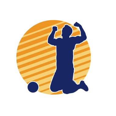 Top tekmeleyen bir erkek futbolcunun silueti. Hareket halindeki bir futbolcunun silueti.