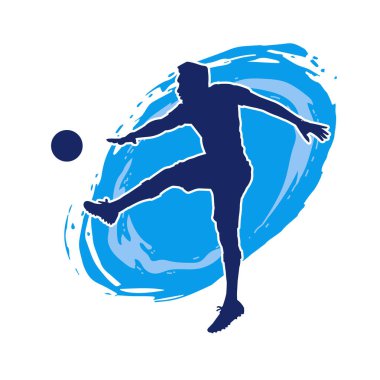 Top tekmeleyen bir erkek futbolcunun silueti. Hareket halindeki bir futbolcunun silueti.