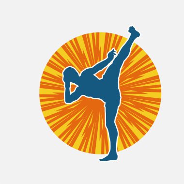 Hareketli erkek kickboksör atletinin silueti. Kickboks yapan bir adamın silueti..